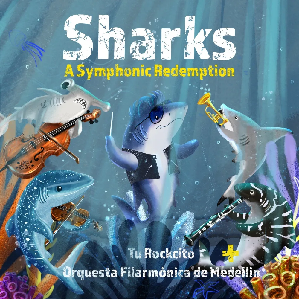 Ilustración colorida de cinco tiburones antropomórficos bajo el mar, cada uno tocando un instrumento musical: un tiburón martillo con un violonchelo, un tiburón ballena con un violín, un tiburón blanco dirigiendo la orquesta, un tiburón mako tocando una trompeta y otro tiburón con un clarinete. El título dice “Sharks: A Symphonic Redemption” y en la parte inferior se lee “Tu Rockcito – Orquesta Filarmónica de Medellín”. El fondo muestra un ambiente submarino con burbujas, corales y luz filtrada desde la superficie.